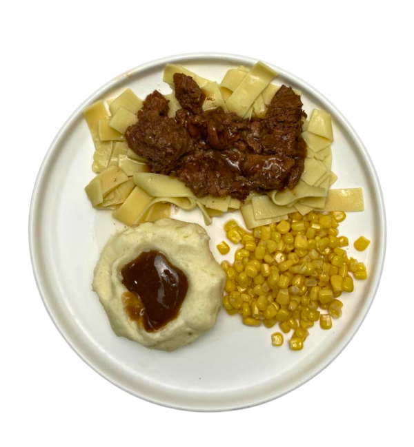 BEEF TIPS AND EGG NOODLES ON PLATE