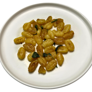 vegan gnocchi with sage butter on a plate